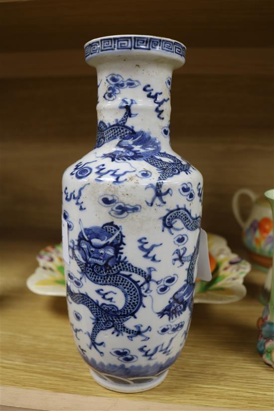 A pair of Canton dragon and phoenix-decorated plates and a 19th century blue and white vase (3)